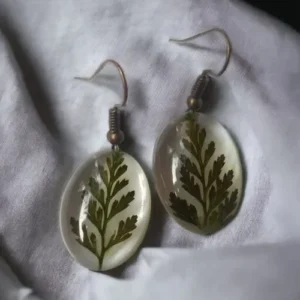 Exquisite Elegance Fern Leaf-Embedded Botanical Earring #LeafINMotion #HandmadeExcellence Anniversary Gifts, Artwork, Birthday Gifts for Her, Botanical Earrings, Botanical Jewellery, Earrings, Eco-Friendly, Floral Earrings, Floral Jewellery, Flower Earrings, Flower Jewellery, Furn Leaf, Gifts for Mother, Gifts for Wife, Gifts for Women, Handcrafted, Handicrafts, Handmade, Jewellery, Mother's Day Gift Ideas, Nature Jewellery, Online Jewellery Store, Resin Jewellery, Valentine's Day Gift