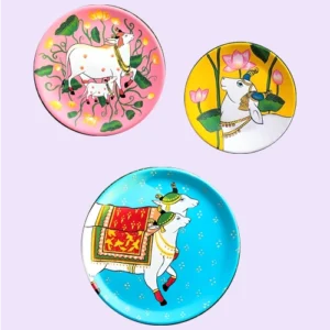 Radiant Pichwai Cow Decor Plate Set | Home Decor | Wall Hanging | Set of 3 | 12, 10 & 8 inch Art Culture Decor Plates, Artwork, Bengali Art Culture Decor Plates, Combo Decor Plates, Decor Plates, Decorative Items, Decorative Plates, Decorative Wall Art, Drawing Room, Eco-Friendly, Handcrafted, Handicrafts, Handmade, Handpainted, Home Decor, Home Interior Decoration, Living Room, Melamine Decor Plates, Paintings, Pichwai Cow, Pichwai Cow Decor Plates, Religious Decor Plates, Wall Art, Wall Decor, Wall Hanging, Wall Plates